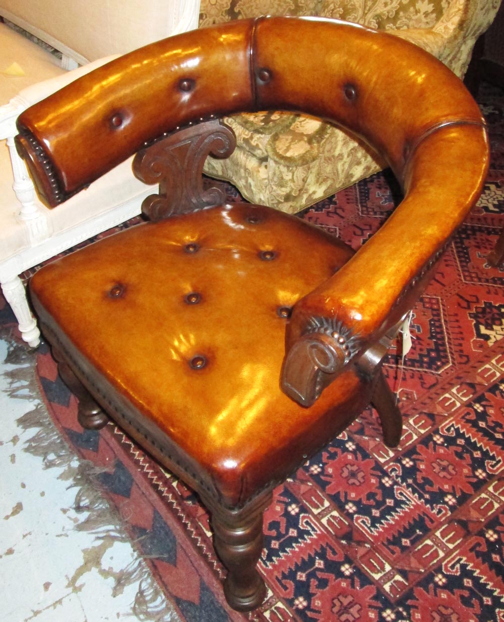 LIBRARY DESK CHAIRS, a pair, late 19th/early 20th century oak each button upholstered in faded tan
