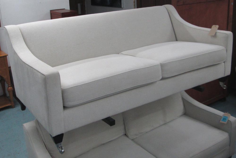 SOFA, two seater, in neutral fabric on square supports, 186cm L. (with faults, marked)