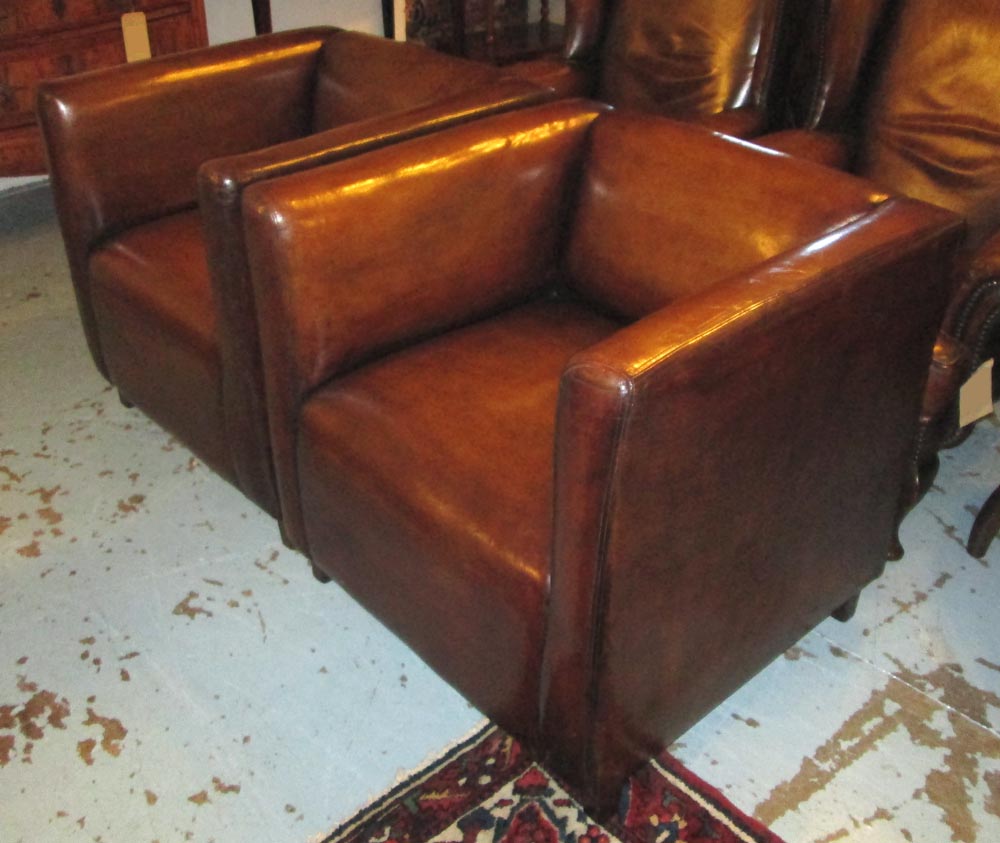 TUB ARMCHAIRS, a pair, faded tan brown hide leather upholstered with square supports, 76cm. (2)