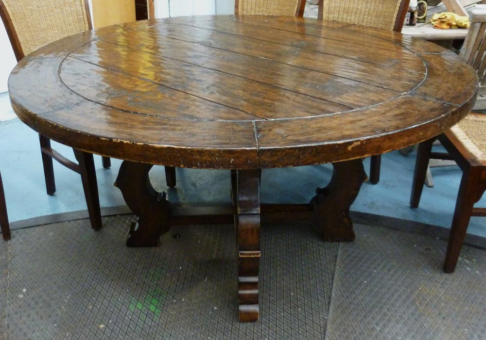 DINING TABLE, circular, Spanish style of solid rustic construction, 152cm x 79cm H.