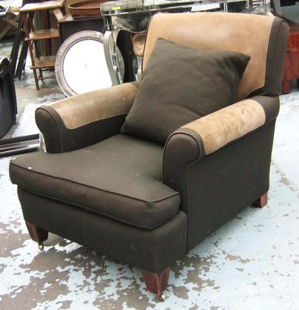 RALPH LAUREN ARMCHAIR, with dark green suede upholstery on tapered supports with a matching cushion,