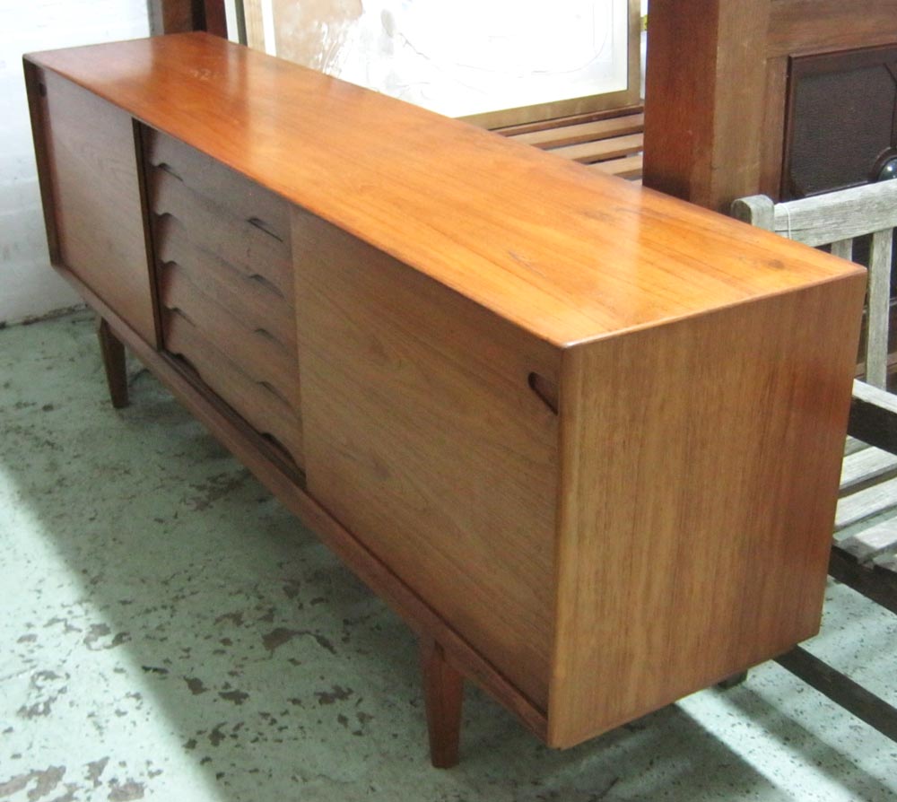DYRLUND SIDEBOARD, Danish with two sliding doors on the sides enclosing shelves and five central