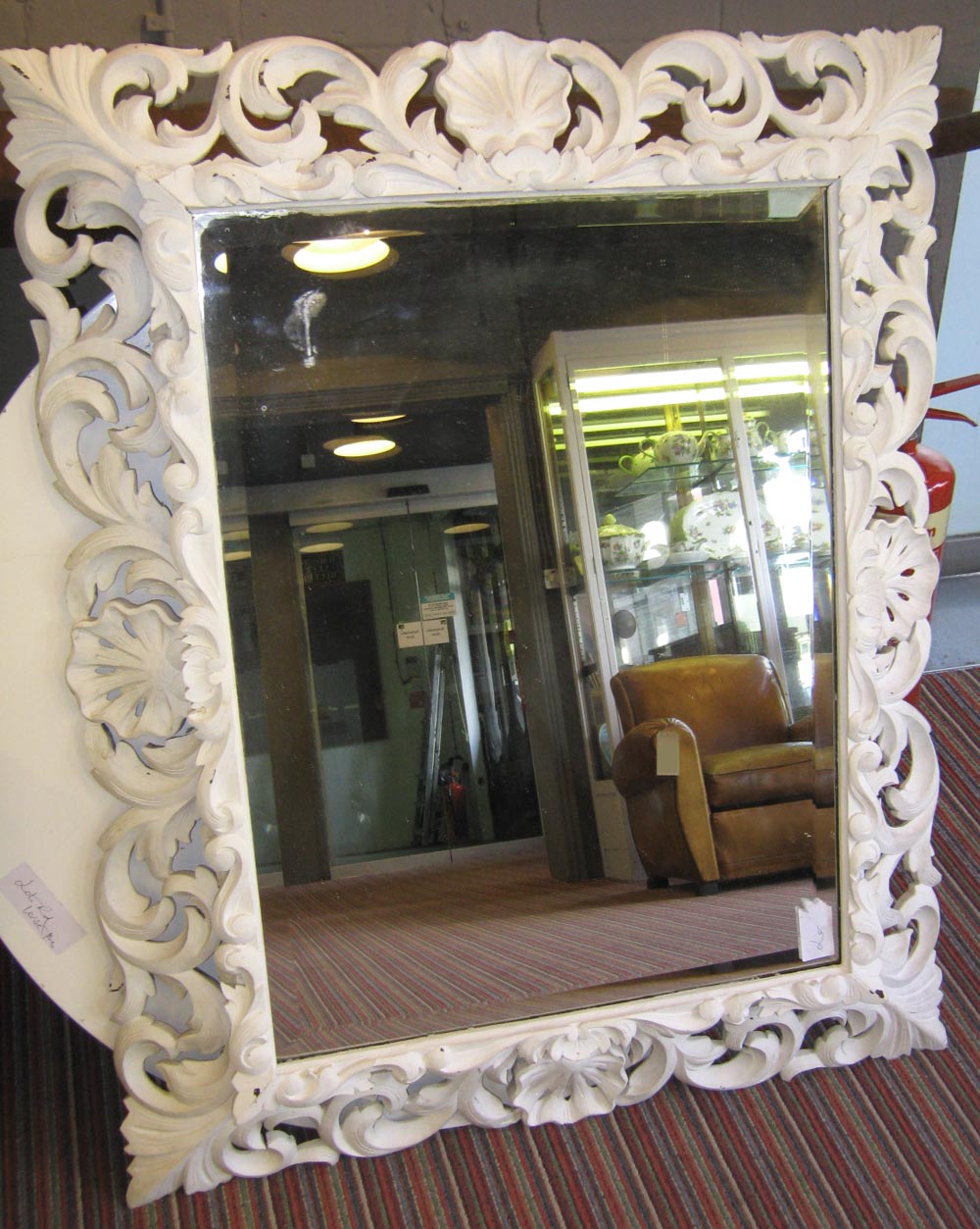 WALL MIRROR, Florentine style painted surrounds, bevelled, 117cm H x 94cm.