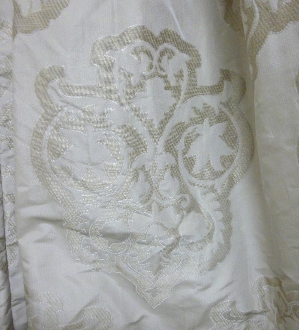 CURTAINS, a pair, ivory, patterned finish with blackout lining, each 200cm W gathered x 300cm D. (