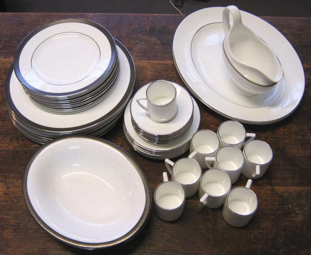 WEDGWOOD DINNER WARES, ten large and ten small plates, comprising two serving dishes, `Metropolis`