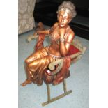 BRONZE STATUE, of a lady in a chair, 44cm H.