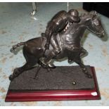 BRONZE STATUE, of a polo player, on a base, 35cm L.