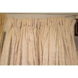CURTAINS, a pair, cream, cotton damask, lined and interlined, each 130cm gathered x  210cm