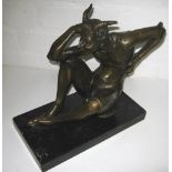 SATYR BRONZE, signed `Milo` seated on a marble plinth, 28cm H x 28cm.