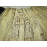 CURTAINS, a pair, pale yellow lined and interlined with assorted pelmets and tie backs, 265cm drop x