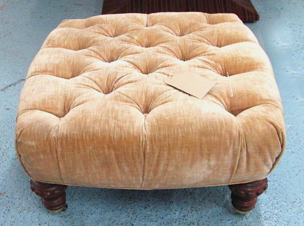 BAKER FOOTSTOOL, in buttoned neutral fabric on turned castor supports, 74cm x 74cm x 59cm H.