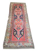 NORTHWEST PERSIAN ANTIQUE MALAYER RUNNER, 290cm x 106cm, a sapphire field of stylised pole