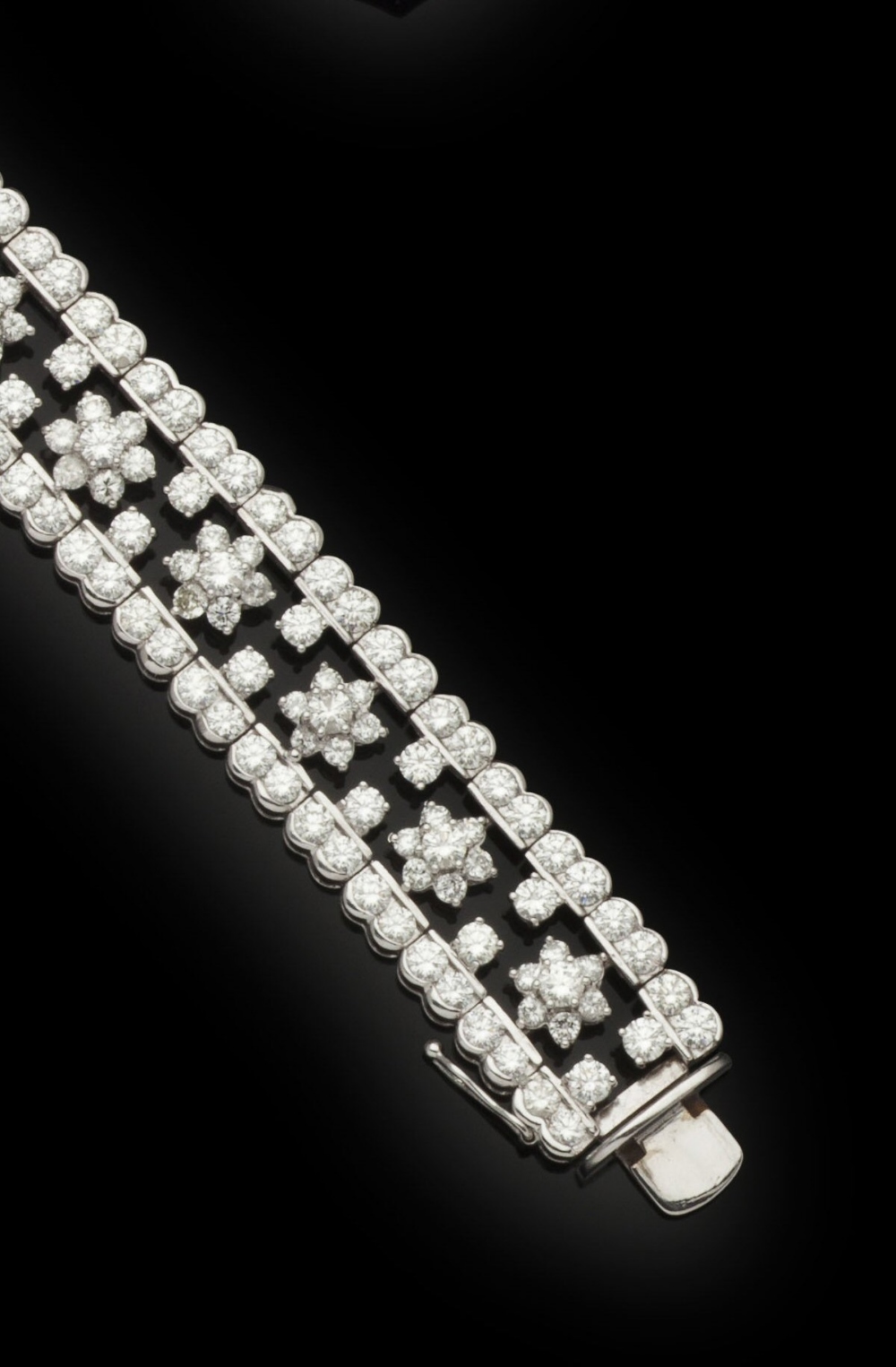 A platinum mounted diamond set braceletof articulated design set throughout with round brilliant - Image 2 of 2