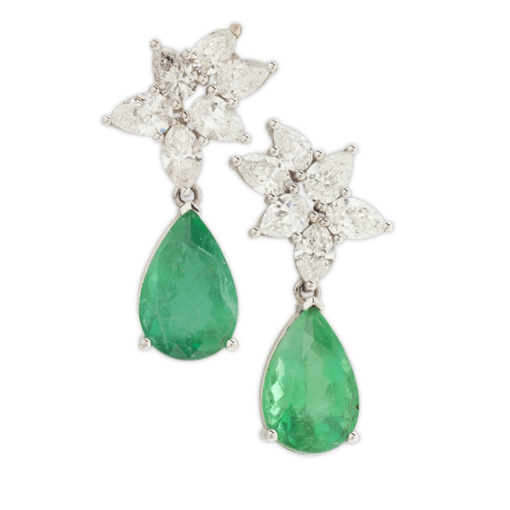 A pair of emerald and diamond set ear pendantseach composed of an asymmetric floral cluster, claw