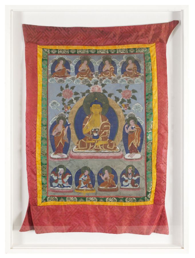 TIBETAN THANKA ON CLOTHhanging scroll, centrally painted with Buddha surrounded by deities,
