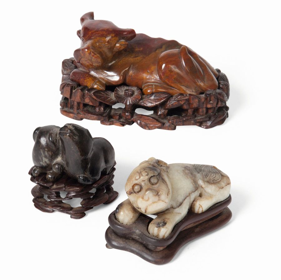 CHINESE JADE CARVING OF PUPPIESMING-STYLEcarved from a dark brown jade in the shape of two puppies,