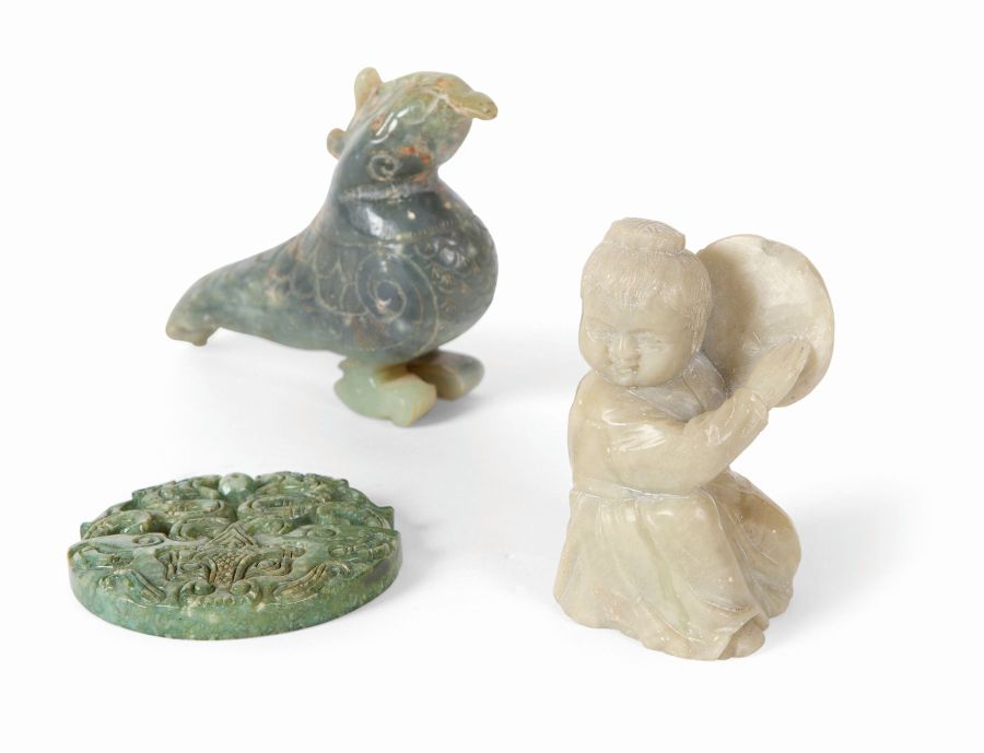 CARVED HARDSTONE FIGURE OF A BOY8cm high; together with a CHINESE HARDSTONE ARCHAIC FORM BIRD, 9cm
