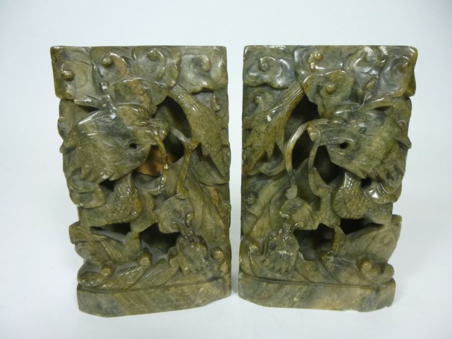 PAIR OF CHINESE GREEN SOAPSTONE BOOKENDSLATE QING DYNASTY / EARLY REPUBLICcarved in high relief