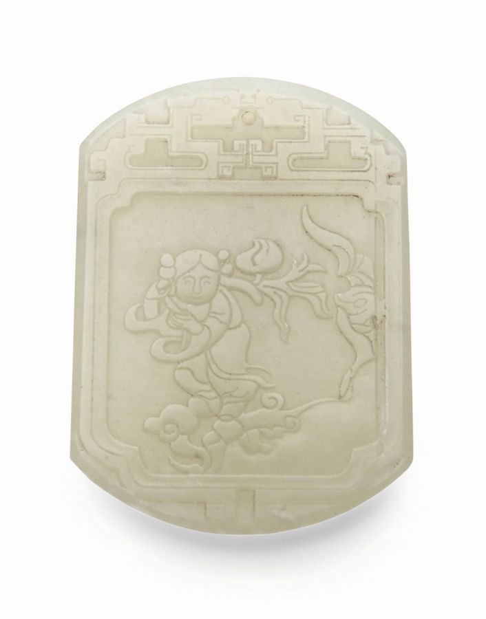 CELADON JADE PENDANTof rounded rectangular form, carved in low relief on one side with a boy among