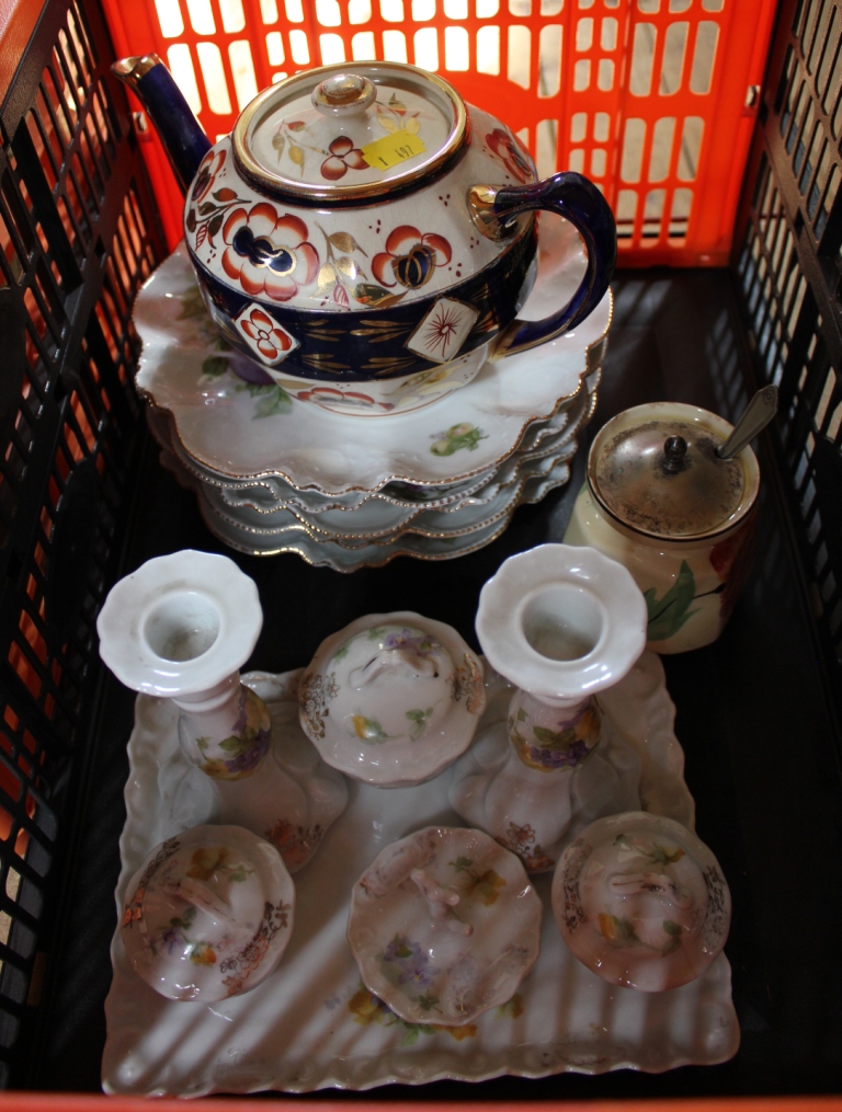 An assortment of household ceramics to include a vanity set, dessert plates, etc
