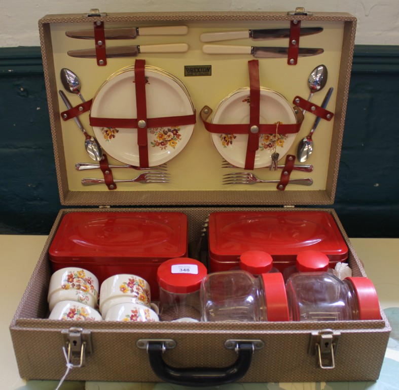 A retro Brexton picnic basket set, complete with food boxes, cups, saucers, plates and cutlery, in