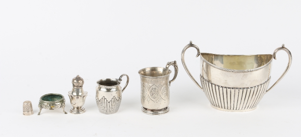 AN OLD SILVER SUGAR BASIN together with a silver thimble, a Christening cup, a pepper pot, a