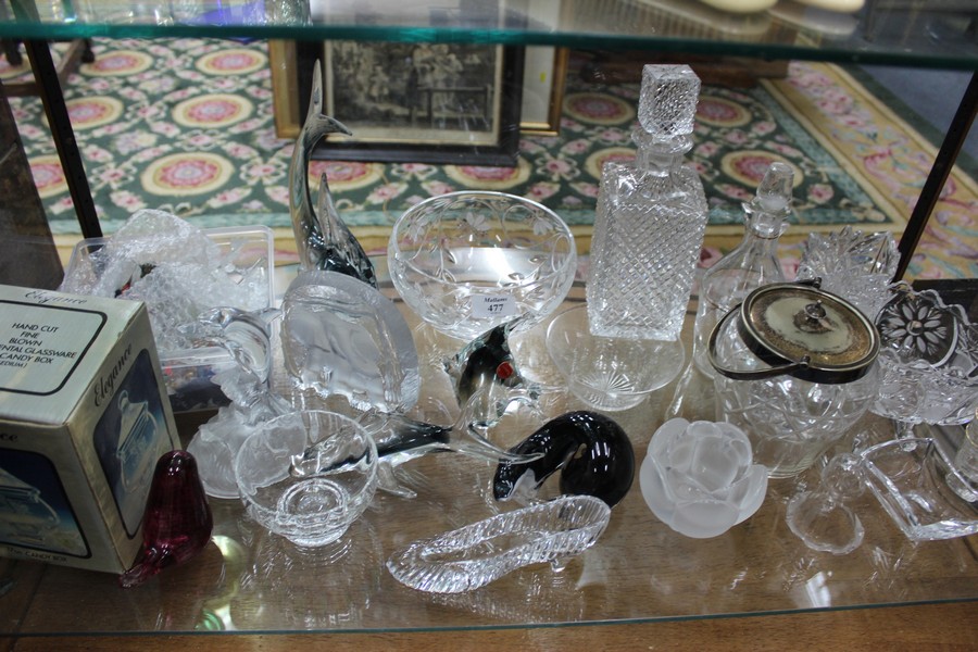 A QUANTITY OF GLASS ANIMALS to include Murano fish, a Langham Otter, a Wedgewood Bird and a large