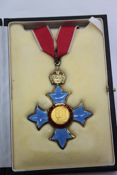 A GEORGE V C.B.E. MEDAL in a fitted case