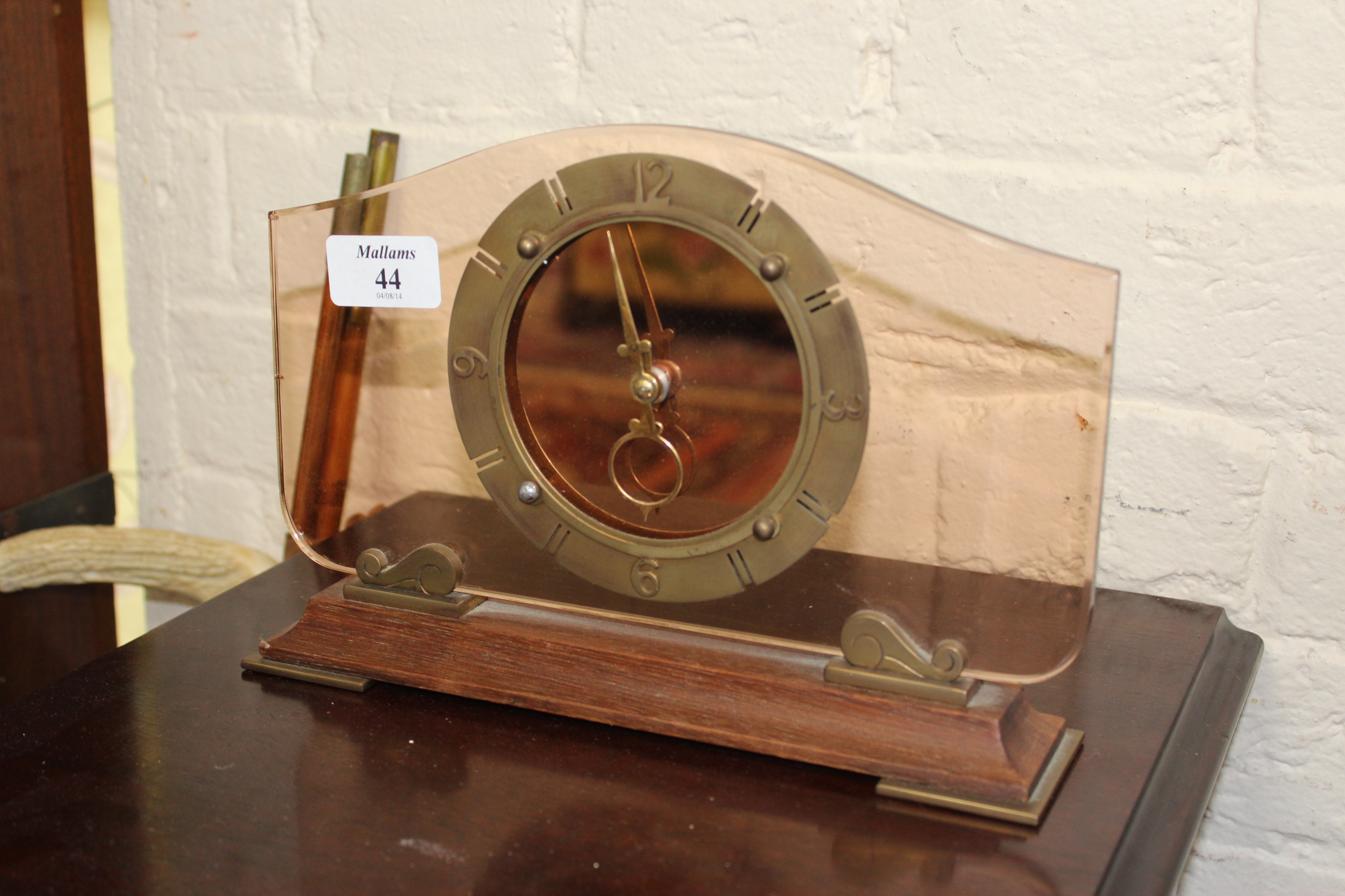 AN ART DECO STYLE  SMITHS ORANGE GLASS MANTLE CLOCK 26cm wide