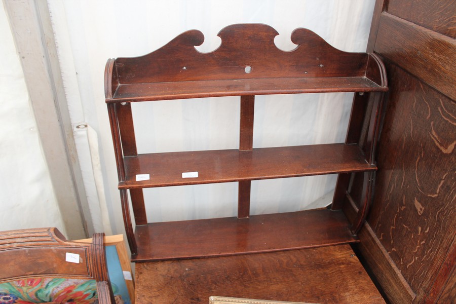 A GEORGE III MAHOGANY ELBOW CHAIR together with a 19th century three tier hanging wall shelf, 54cm