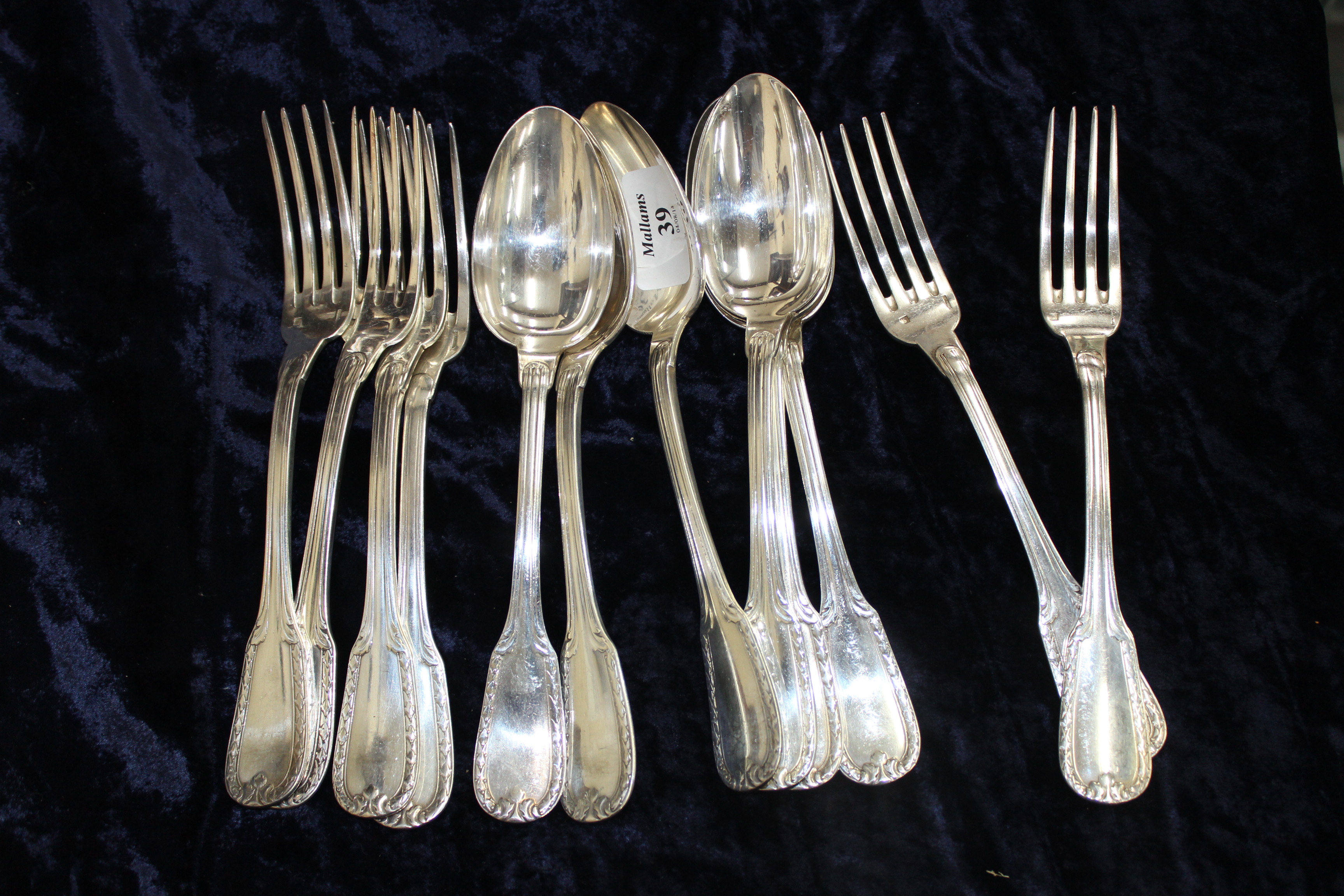 A SET OF SIX CONTINENTAL WHITE METAL SPOONS and a set of six continental white metal forks