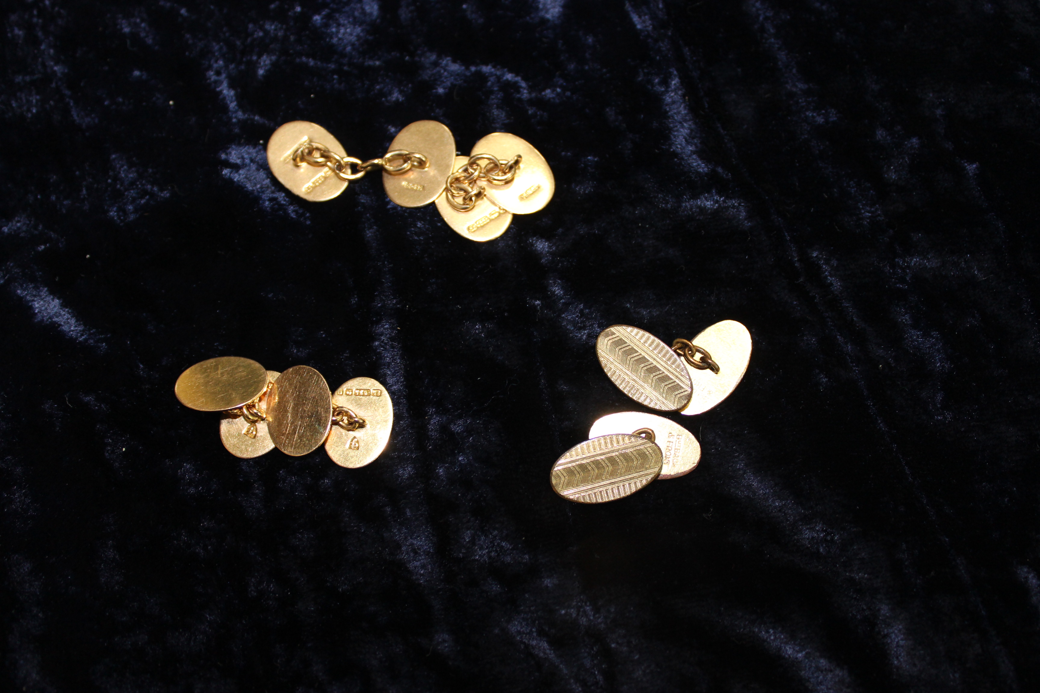 TWO PAIRS OF 15CT GOLD CUFFLINKS and a pair of gold plated cufflinks