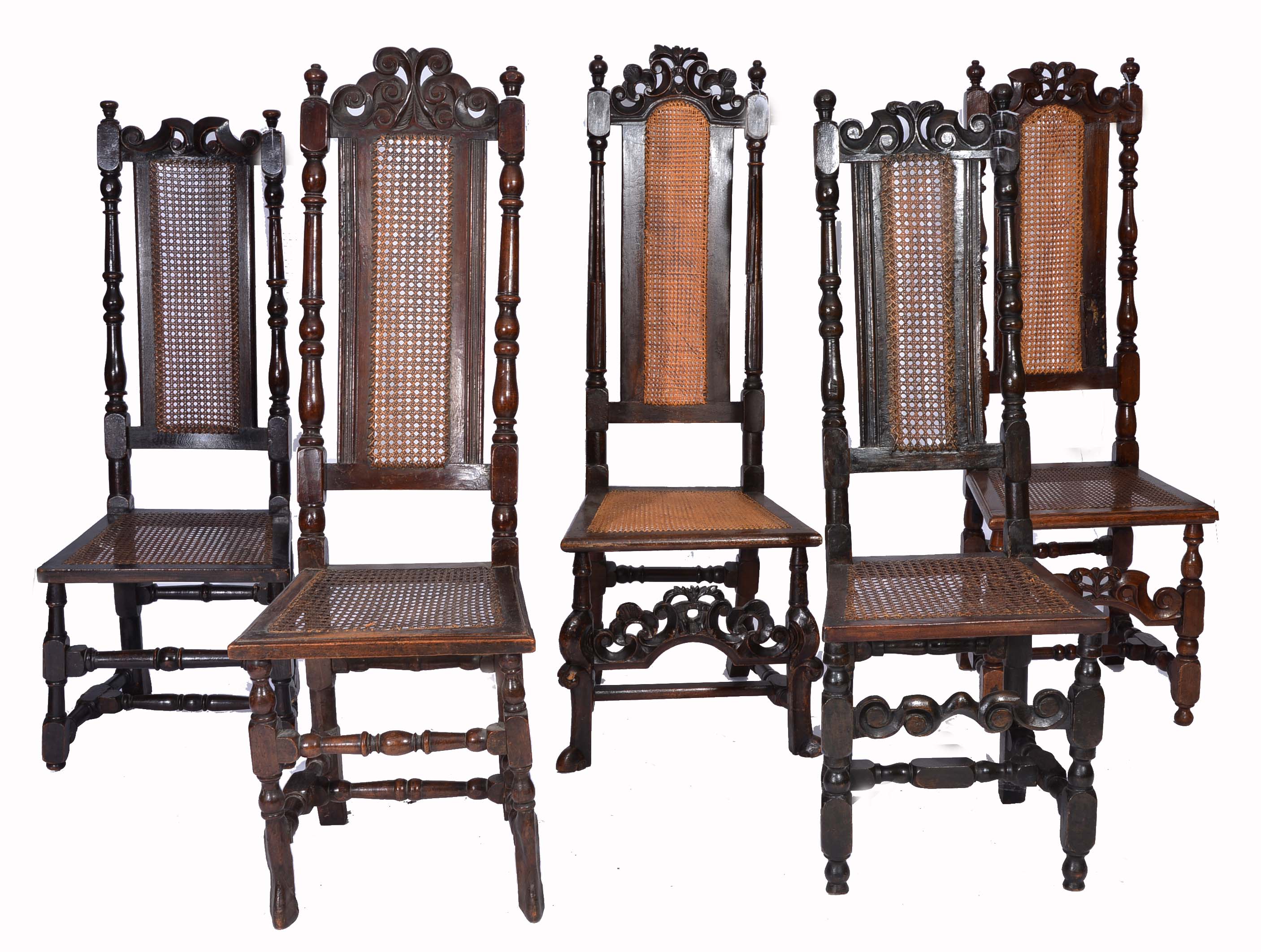 A COLLECTION OF FIVE LATE 17TH CENTURY AND LATER HIGH BACK CHAIRS each with carved decoration,