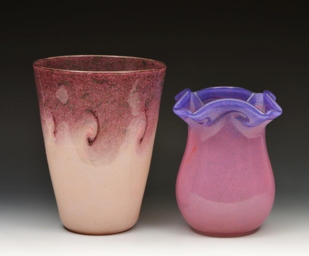 A VASART GLASS VASE with undulating rim, mottled purple with whorls graduating to pink,