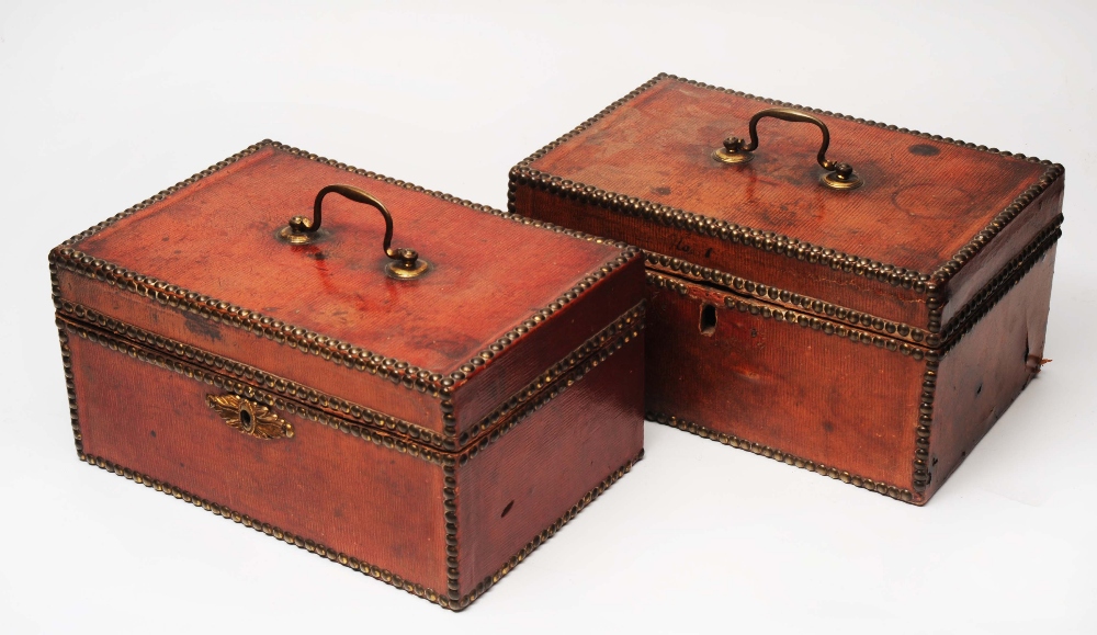 A PAIR OF GEORGE III RED LEATHER AND BRASS STUDDED CORRESPONDENCE BOXES with paper lined interior