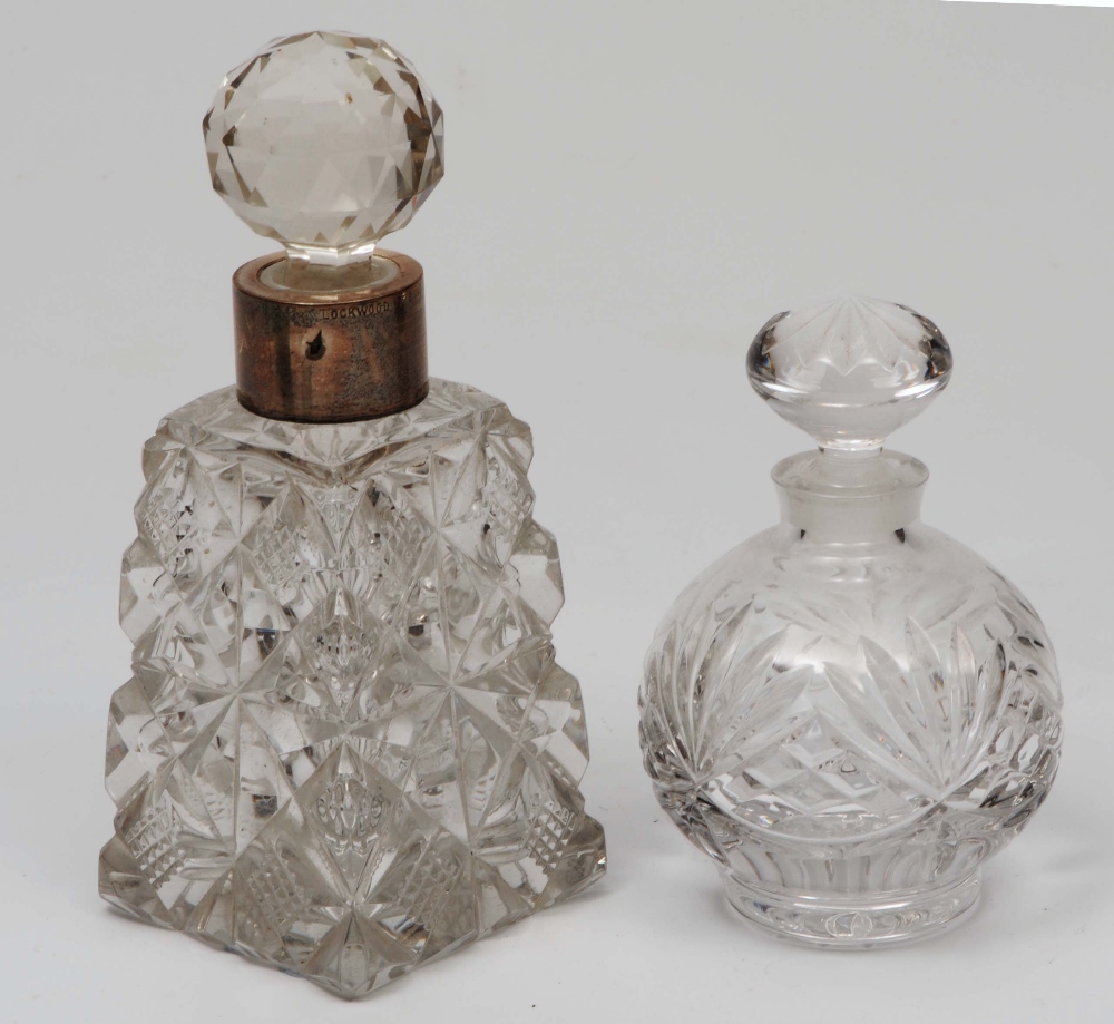 AN EARLY 20TH CENTURY SILVER MOUNTED CUT GLASS SCENT BOTTLE , the mount stamped Lockwood, 75 Bond