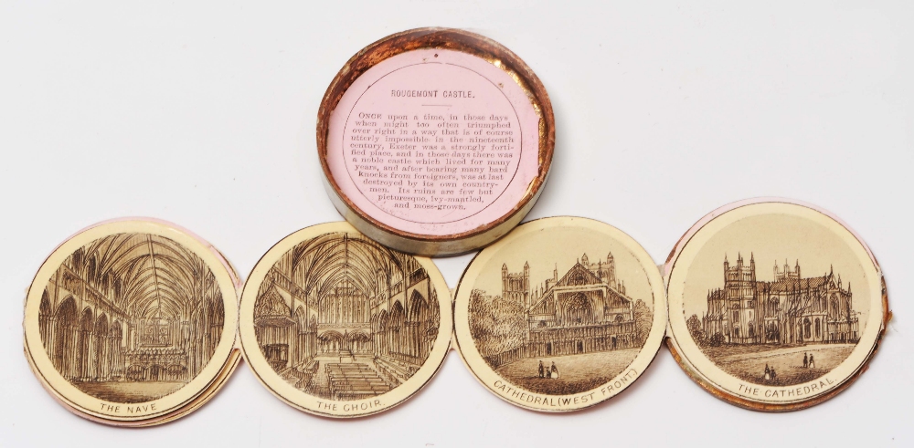 A PHOTO MEDALLION SOUVENIR of Exeter published by `C.R. and Co. London`, fourteen inked images on