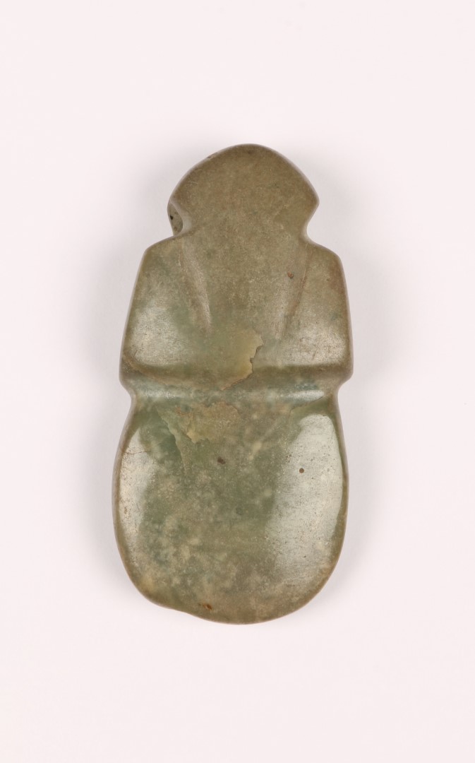 A COSTA RICA PALE GREEN JADE pendant in the form of a bird, c300-900AD, 6cm
