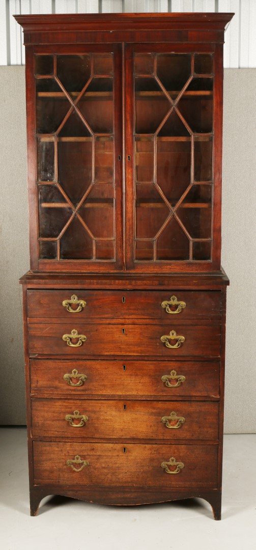 A GEORGE III MAHOGANY SECRETAIRE BOOKCASE of small proportions with glazed upper half, fitted