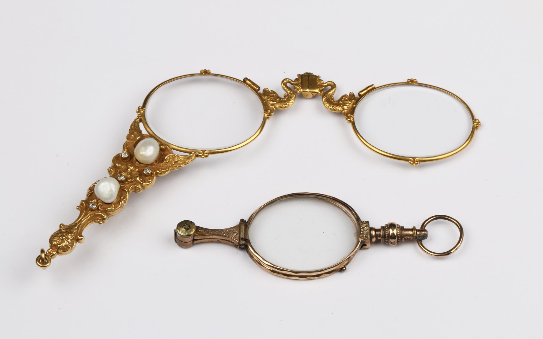 A PAIR OF FRENCH 14CT GOLD, PEARL AND DIAMOND LORGNETTES, one handle set with three baroque pearls