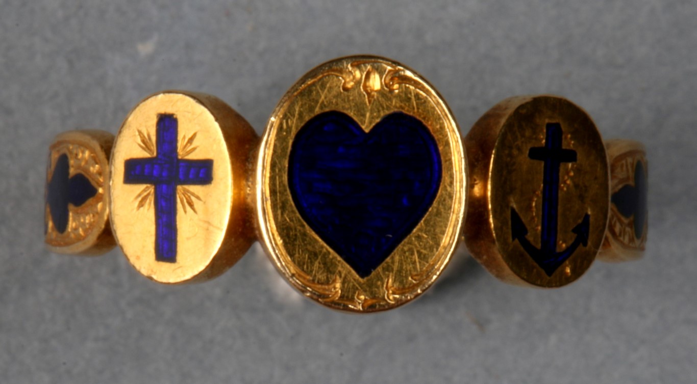 A VICTORIAN GOLD AND ENAMEL `LOVE, HOPE AND CHARITY` RING with three enamelled panels with