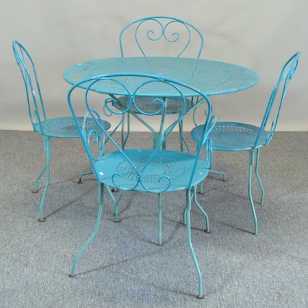 A blue painted metal circular garden table 95cm, together with four matching chairs