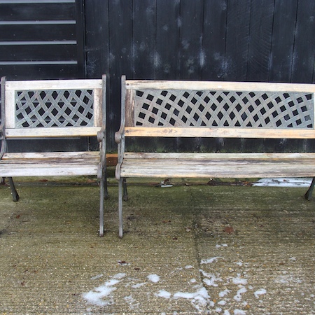 A slatted hardwood and cast iron garden bench, 126cm, together with a matching chair