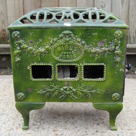 A late 19th century French green enamelled stove, Mirus Paris, 49cm