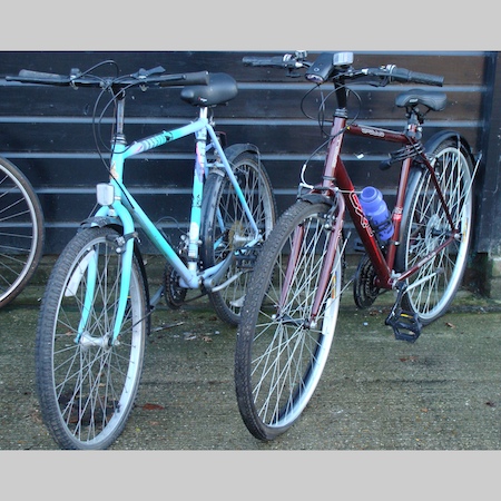 A modern ladies Raleigh mountain bike, together with another similar