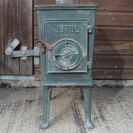 A French green enamelled Jotal stove, 64cm tall