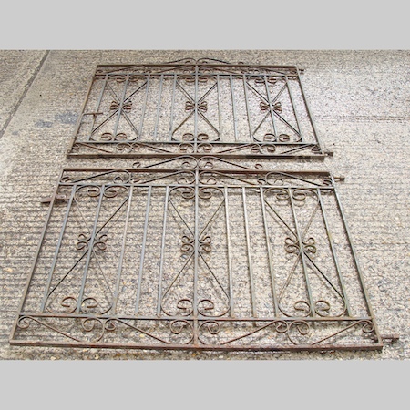 A pair of wrought iron gates, 115cm each