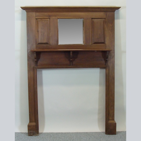 An early 20th century pine fire surround with a mirror insert, 178cm tall