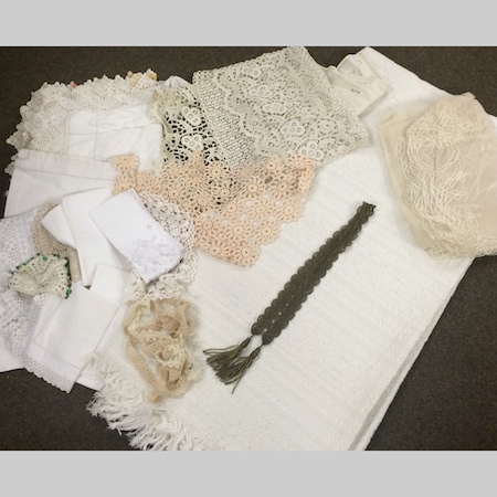 A collection of linen and lace