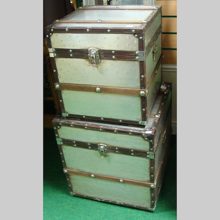 A wooden bound metal travelling trunk, 49cm, together with another smaller